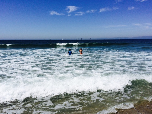 The boys playing in the ocean at Hermosa Beach